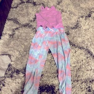 A set of girls pajamas purple/pink tang top with lcotton candy color pjs pants.